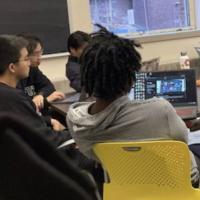 Milstein students work on their laptops during a photo editing short course with Simon Wheeler.