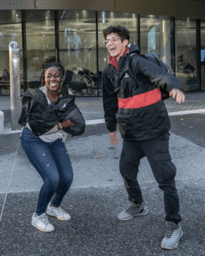 Milstein students jumping in the air at Cornell Tech